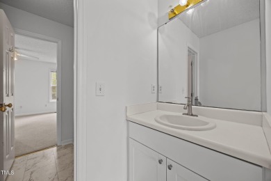 Welcome to this affordable 2-bedroom, 1.5-bath townhome in a on Hedingham Golf and Athletic Club in North Carolina - for sale on GolfHomes.com, golf home, golf lot