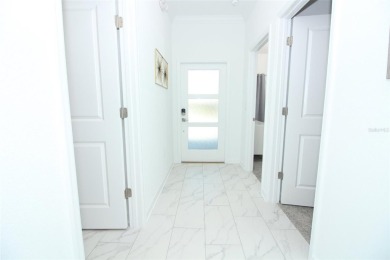 Corner Townhouse in ChampionsGate - 5 Beds | 4 Baths | Private on ChampionsGate Golf Resort in Florida - for sale on GolfHomes.com, golf home, golf lot