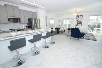 Corner Townhouse in ChampionsGate - 5 Beds | 4 Baths | Private on ChampionsGate Golf Resort in Florida - for sale on GolfHomes.com, golf home, golf lot