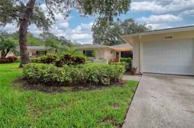 This home is a Head Turner, You are welcomed by the grand double on Palm Aire Country Club of Sarasota in Florida - for sale on GolfHomes.com, golf home, golf lot