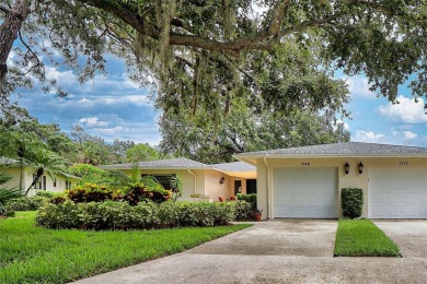 This home is a Head Turner, You are welcomed by the grand double on Palm Aire Country Club of Sarasota in Florida - for sale on GolfHomes.com, golf home, golf lot