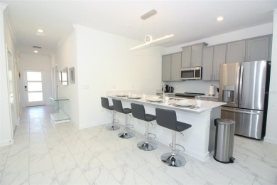 Corner Townhouse in ChampionsGate - 5 Beds | 4 Baths | Private on ChampionsGate Golf Resort in Florida - for sale on GolfHomes.com, golf home, golf lot