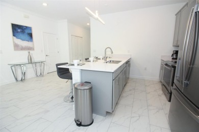 Corner Townhouse in ChampionsGate - 5 Beds | 4 Baths | Private on ChampionsGate Golf Resort in Florida - for sale on GolfHomes.com, golf home, golf lot