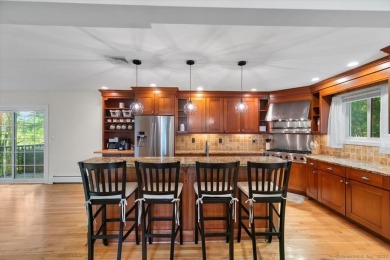 Prepare to be impressed! This stunning 4-bedroom, 2 full and 2 on  in Connecticut - for sale on GolfHomes.com, golf home, golf lot
