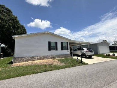 ADORABLE THREE BED, TWO BATH HOME ON INTERIOR LOT! 2002 Jacobsen on Four Lakes Golf Club in Florida - for sale on GolfHomes.com, golf home, golf lot