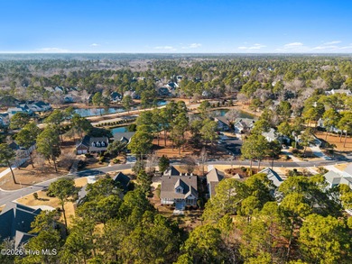 Welcome to 597 Riverwood Dr in Winding River Plantation! This on Carolina National Golf Club in North Carolina - for sale on GolfHomes.com, golf home, golf lot