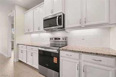 GOLF COURSE HOME WITH NO CARPET, IMPACT WINDOWS, AND 2.5-CAR on Herons Glen Golf and Country Club in Florida - for sale on GolfHomes.com, golf home, golf lot