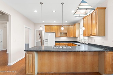 Welcome to 597 Riverwood Dr in Winding River Plantation! This on Carolina National Golf Club in North Carolina - for sale on GolfHomes.com, golf home, golf lot