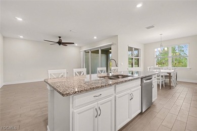 GOLF COURSE HOME WITH NO CARPET, IMPACT WINDOWS, AND 2.5-CAR on Herons Glen Golf and Country Club in Florida - for sale on GolfHomes.com, golf home, golf lot