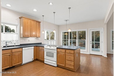 Welcome to 597 Riverwood Dr in Winding River Plantation! This on Carolina National Golf Club in North Carolina - for sale on GolfHomes.com, golf home, golf lot