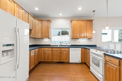 Welcome to 597 Riverwood Dr in Winding River Plantation! This on Carolina National Golf Club in North Carolina - for sale on GolfHomes.com, golf home, golf lot