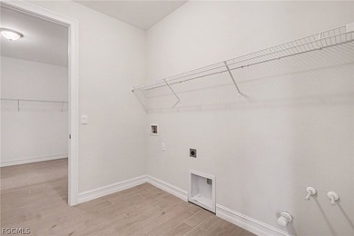 GOLF COURSE HOME WITH NO CARPET, IMPACT WINDOWS, AND 2.5-CAR on Herons Glen Golf and Country Club in Florida - for sale on GolfHomes.com, golf home, golf lot