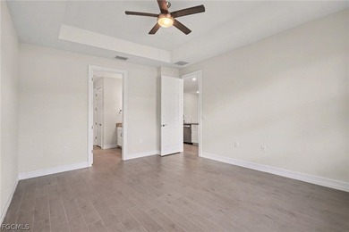 GOLF COURSE HOME WITH NO CARPET, IMPACT WINDOWS, AND 2.5-CAR on Herons Glen Golf and Country Club in Florida - for sale on GolfHomes.com, golf home, golf lot