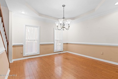 Welcome to 597 Riverwood Dr in Winding River Plantation! This on Carolina National Golf Club in North Carolina - for sale on GolfHomes.com, golf home, golf lot