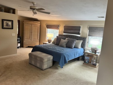Large Living Room with gas fireplace and Large windows to enjoy on Geneva Golf Club in Illinois - for sale on GolfHomes.com, golf home, golf lot