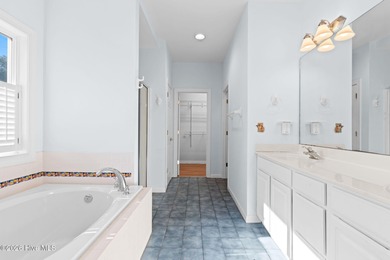 Welcome to 597 Riverwood Dr in Winding River Plantation! This on Carolina National Golf Club in North Carolina - for sale on GolfHomes.com, golf home, golf lot