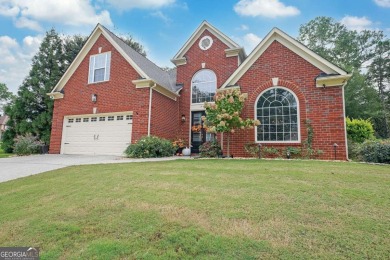 Welcome to this stunning 4-bedroom, 3-bath home in sought-after on Trophy Club of Apalachee in Georgia - for sale on GolfHomes.com, golf home, golf lot