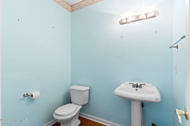 Welcome to 597 Riverwood Dr in Winding River Plantation! This on Carolina National Golf Club in North Carolina - for sale on GolfHomes.com, golf home, golf lot