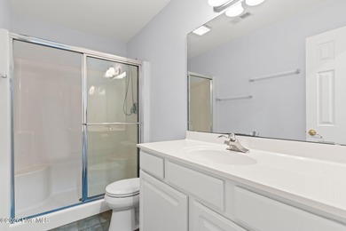 Welcome to 597 Riverwood Dr in Winding River Plantation! This on Carolina National Golf Club in North Carolina - for sale on GolfHomes.com, golf home, golf lot