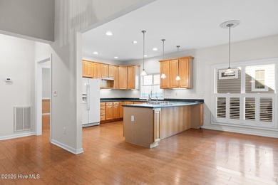 Welcome to 597 Riverwood Dr in Winding River Plantation! This on Carolina National Golf Club in North Carolina - for sale on GolfHomes.com, golf home, golf lot