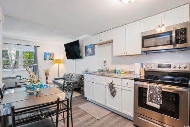 Welcome to your perfect retreat in the charming efficiency unit on Heron Point Golf Club in South Carolina - for sale on GolfHomes.com, golf home, golf lot