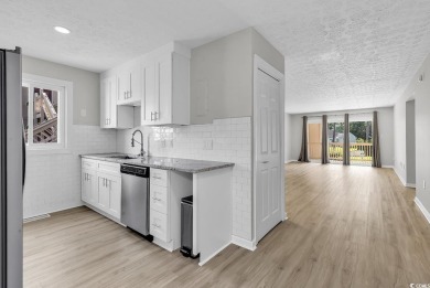 Renovated top to bottom, this Shorewood unit located less than on Myrtlewood Golf Course and Club  in South Carolina - for sale on GolfHomes.com, golf home, golf lot