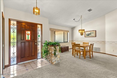 Charming 3-Bed, 2-Bath Pool Home on the Golf Course! This on The Grand Club - Pine Lakes Course in Florida - for sale on GolfHomes.com, golf home, golf lot