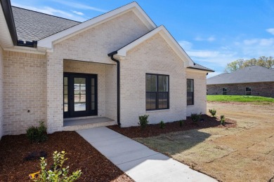 This new construction on Double Sized Lot located in Muscle on Cypress Lakes Golf and Country Club in Alabama - for sale on GolfHomes.com, golf home, golf lot