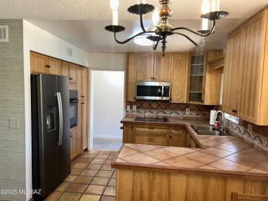 Desert oasis with Spanish Revival charm in Green Valley's on Haven Golf Club in Arizona - for sale on GolfHomes.com, golf home, golf lot