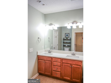 PRICE IMPROVEMENT. Open and airy floor plan in a sought after on Summergrove Golf Club in Georgia - for sale on GolfHomes.com, golf home, golf lot