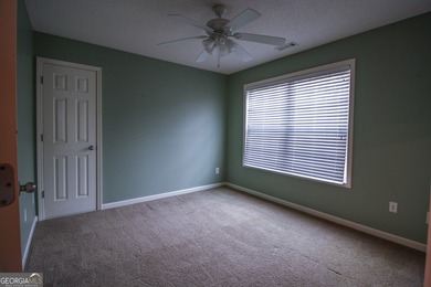 PRICE IMPROVEMENT. Open and airy floor plan in a sought after on Summergrove Golf Club in Georgia - for sale on GolfHomes.com, golf home, golf lot