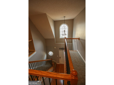 PRICE IMPROVEMENT. Open and airy floor plan in a sought after on Summergrove Golf Club in Georgia - for sale on GolfHomes.com, golf home, golf lot