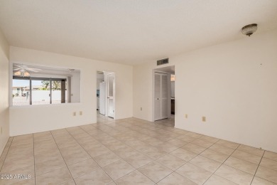 Three bedrooms, 2 bathrooms await you in this home nestled on a on Sun City Lakes West and East in Arizona - for sale on GolfHomes.com, golf home, golf lot