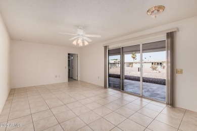 Three bedrooms, 2 bathrooms await you in this home nestled on a on Sun City Lakes West and East in Arizona - for sale on GolfHomes.com, golf home, golf lot