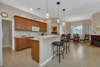 AWESOME OPEN CONCEPT in this FULLY FURNISHED/TURNKEY Legacy on Kings Gate Golf Club in Florida - for sale on GolfHomes.com, golf home, golf lot