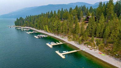Lake Living! Settled above the shoreline of Whitefish Lake and on Iron Horse Golf Club in Montana - for sale on GolfHomes.com, golf home, golf lot