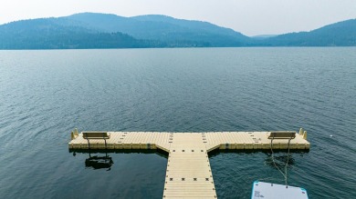 Lake Living! Settled above the shoreline of Whitefish Lake and on Iron Horse Golf Club in Montana - for sale on GolfHomes.com, golf home, golf lot