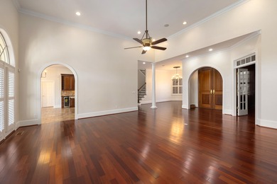 Wake up to shimmering water views in this stunning waterfront on Players Course At Wyboo Plantation in South Carolina - for sale on GolfHomes.com, golf home, golf lot