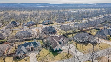 So much bang for your buck! This luxurious home has so much to on Pecan Plantation Country Club in Texas - for sale on GolfHomes.com, golf home, golf lot