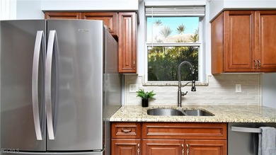 Nestled within a gated semi-private golf community, this twin on Westminster Golf Club in Florida - for sale on GolfHomes.com, golf home, golf lot