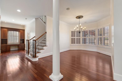 Wake up to shimmering water views in this stunning waterfront on Players Course At Wyboo Plantation in South Carolina - for sale on GolfHomes.com, golf home, golf lot