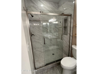 Stunning Bottom-Floor Condo with stunning views in a  Premier on Rarity Bay Country Club - Loudon in Tennessee - for sale on GolfHomes.com, golf home, golf lot