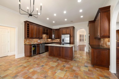 Wake up to shimmering water views in this stunning waterfront on Players Course At Wyboo Plantation in South Carolina - for sale on GolfHomes.com, golf home, golf lot