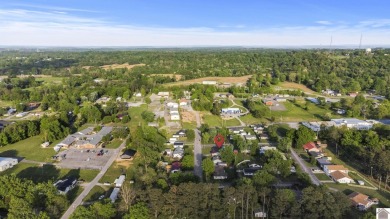 Welcome to this beautifully updated, move-in-ready home! on Marion Country Club in Kentucky - for sale on GolfHomes.com, golf home, golf lot
