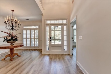 Discover a meticulously designed home that seamlessly blends on Canongate At Olde Atlanta Golf Club in Georgia - for sale on GolfHomes.com, golf home, golf lot