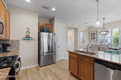 Escape to Paradise in this Barbuda Villa on a POND! This beauty on LPGA International Golf Course in Florida - for sale on GolfHomes.com, golf home, golf lot