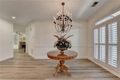 Discover a meticulously designed home that seamlessly blends on Canongate At Olde Atlanta Golf Club in Georgia - for sale on GolfHomes.com, golf home, golf lot