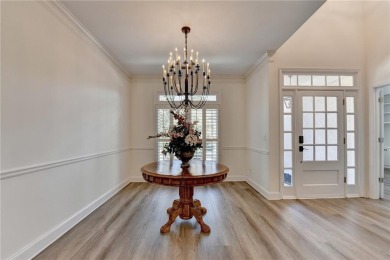 Discover a meticulously designed home that seamlessly blends on Canongate At Olde Atlanta Golf Club in Georgia - for sale on GolfHomes.com, golf home, golf lot