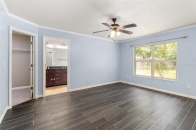 Welcome to this beautiful 3-bedroom, 2-bath home nestled in the on Turkey Creek Golf and Country Club in Florida - for sale on GolfHomes.com, golf home, golf lot