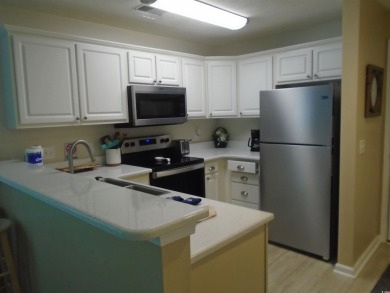 Lovely 2 BR, 2 Bath villa and very nicely furnished.  LVT on True Blue Plantation in South Carolina - for sale on GolfHomes.com, golf home, golf lot